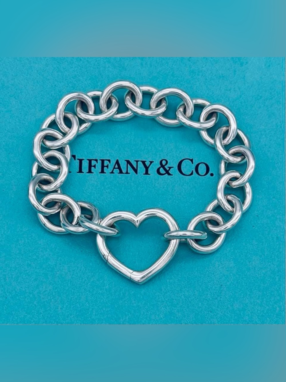 Tiffany & Co SS Retired Chunky clasping heart bracelet‎ 7.75”